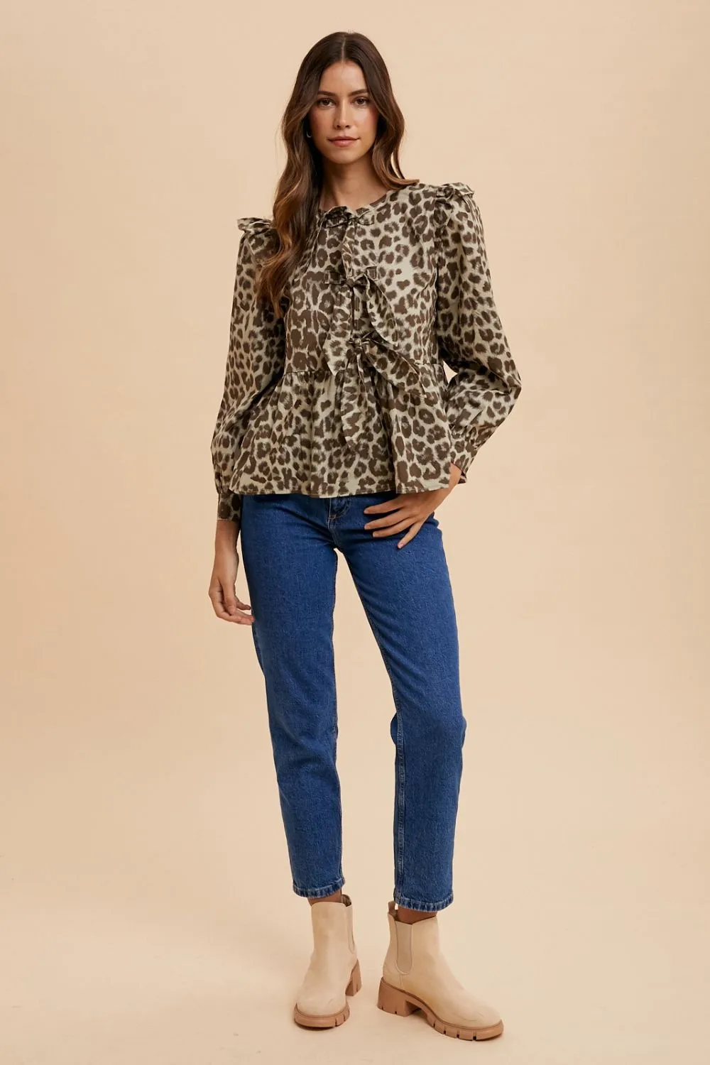 Blue Zone Planet |  Annie Wear Tied Leopard Round Neck Peplum Blouse